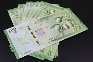 سوريا تبدأ التسعير بالليرة الجديدة: الذهب يرتفع والمحروقات تُحدد وفق سعر صرف 120