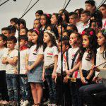 100 طفل وطفلة يغنون على مسرح مجمع دمر احتفالاً بانتخاب الدكتور بشار الأسد رئيساً للجمهورية