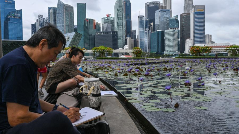 AFP__20250218__36XX6J4__v1__HighRes__SingaporeEconomyBudget.jpg