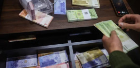 حاكم المركزي: تغيرات سعر الصرف سببها عوامل نفسية بعد طرح الليرة الجديدة